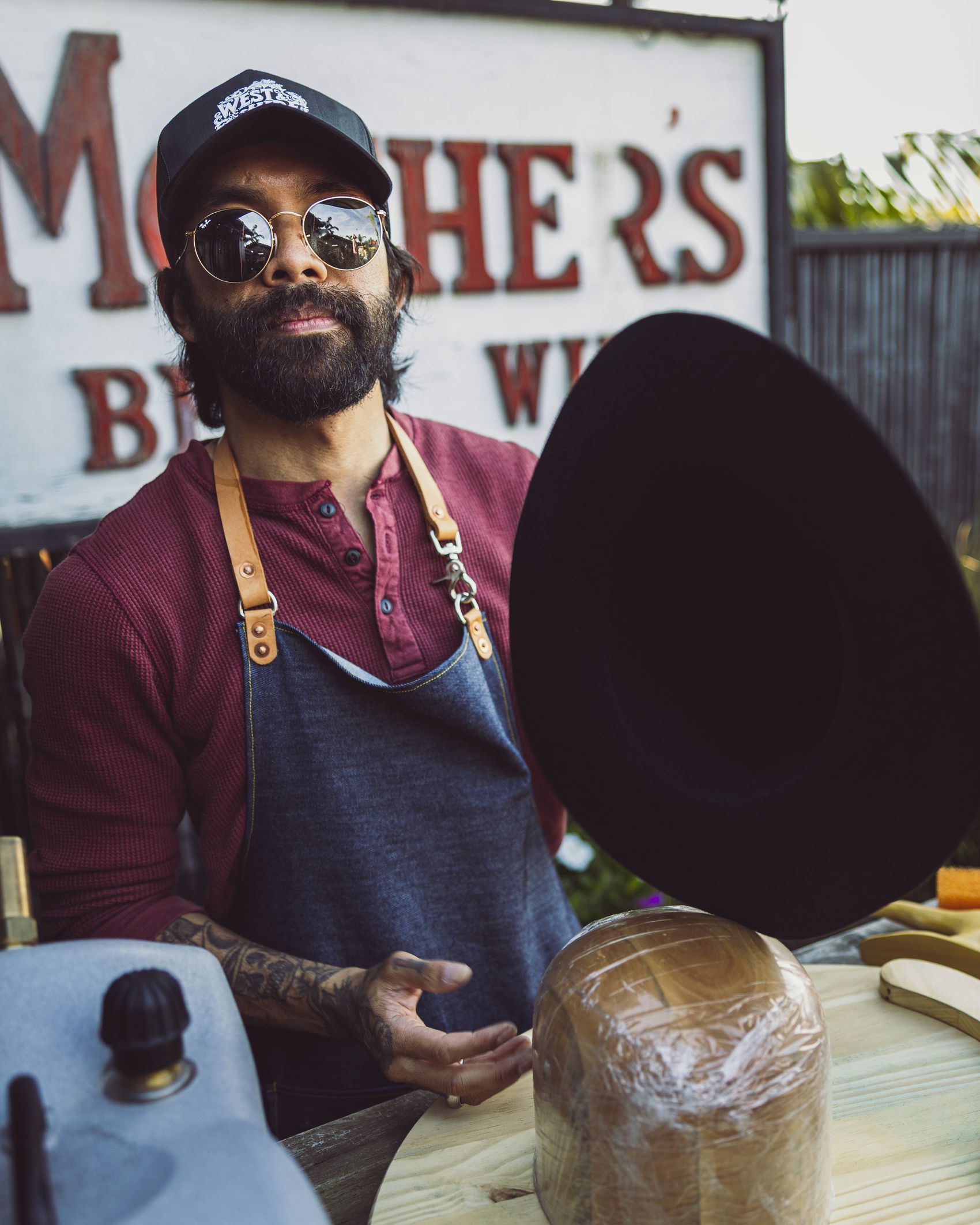 Felt hat on a wooden hat block